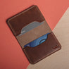 nterior view of the Terrain personalized leather bifold wallet, featuring an original photograph of fields and mountains printed on genuine leather personalized with initials. Ideal gift for nature enthusiasts.